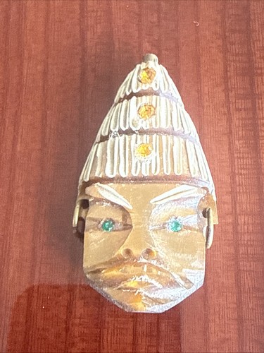 Unusual carved tigers eye - eye, head