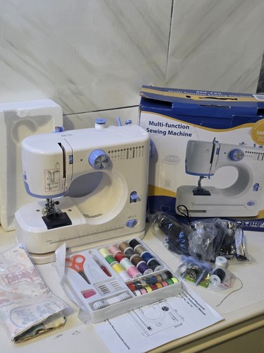 Portable mini electric sewing - mini,