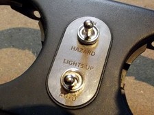 Hazard headlamp popup toggle