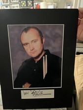 Phil Collins Photo Holding