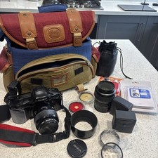 Minolta Dynax 7xi 35mm SLR Film camera wit 2 lenses and extras 