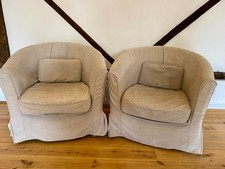 Two Ikea Tullsta Tub Chairs with beige covers
