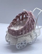 Dolls house wicker pram with baby  small in 1/12th Scale. 