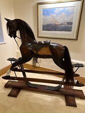 rocking horse wooden 6feet long 5feet in height width 2feet app Stevenson manuf