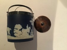 Wedgewood blue jasperware biscuit barrel.  Good condition and original epns lid