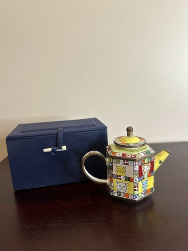 Trade aid miniature teapot - aid,
