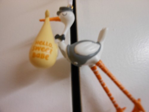 Hallmark stork carrying baby - hallmark,