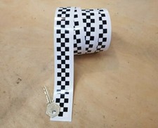 Black white chequered tape - &,