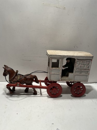 Antique cast iron toy milk - toy,