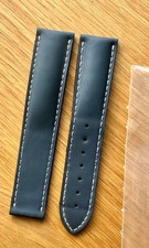 A GENUINE BLUE OMEGA LEATHER WATCH STRAP, REF. 98000210, 20MM TO 18MM