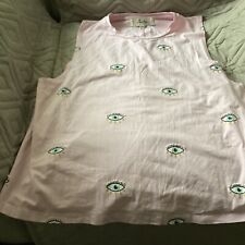 Pink sleeveless top with eyes on them made by koala Bay