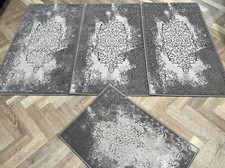 ROMANY GYPSY NON WASHABLE SET OF 4 TOURER 67X110CM RUGS/MATS GREY-SILVER.
