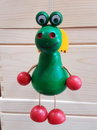 Wooden mascot spring a - mascot, on