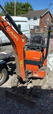 Mini Digger And Trailer