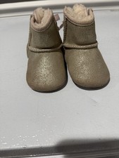 Infant Girl's UGG Jesse Bow Ii Metallic Bootie, Size 2/3 M - Metallic