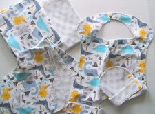 Flannel Baby Dinosaurs 2 Blankets 2 Burb Cloths and  1 Full Body Bib Reversible