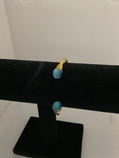 Gold Tone Torque Bangle