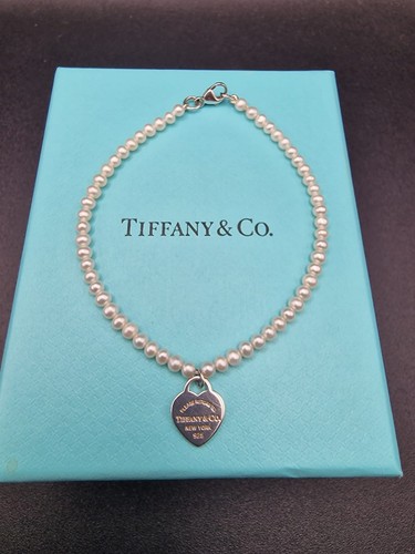 Return tiffany co - &,