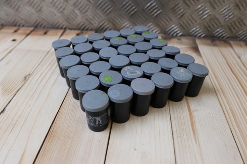 Empty 35mm film canisters - empty,