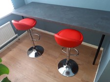 Worktop/bar plus 2 bar stools in faux red leather. All unused in new condition