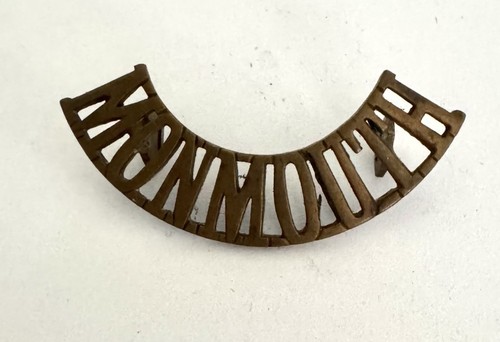 Original brass shoulder title - original,