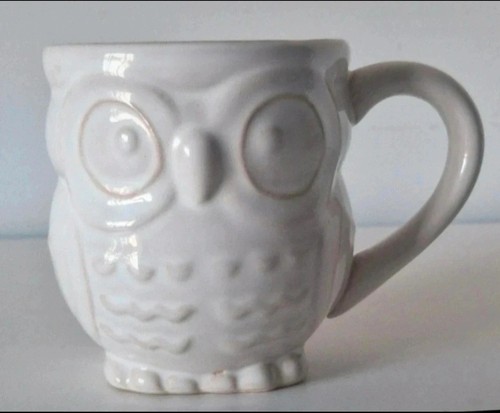 White embossed owl shaped - embossed,