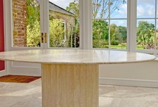 Oval travertine dining table