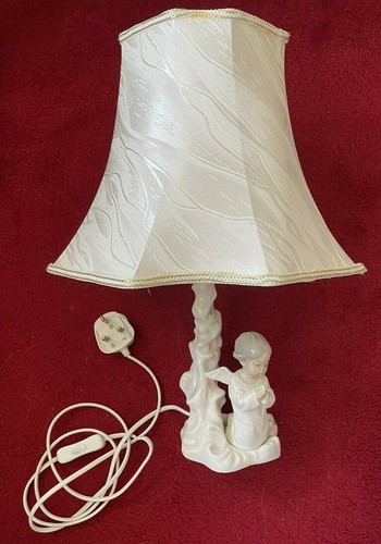Lladro kneeing boy - kneeing,
