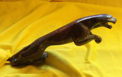 Early bronze leaping cat - leaping,