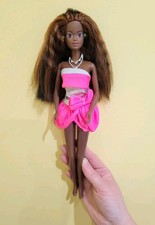 Vintage Doll- wearing Barbie