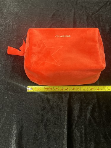 New unused clarins red velour - unused,