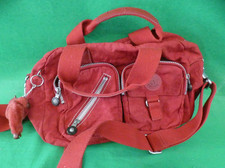  red Kipling Defea shoulder