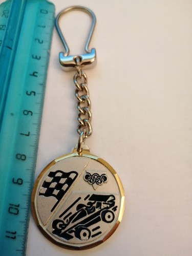 1991 press rally keychain - 1991,