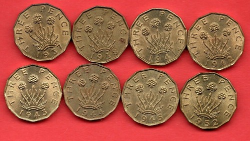 Brass threepence coins - x,