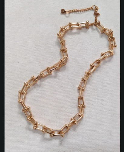 River island gold tone link - river, u-link