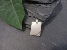 Silver pendant dog tag for