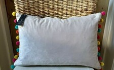 GREY VELVET POM POM CUSHIONS