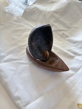 Small Wooden Boat Made with Coconut And a Hard wood