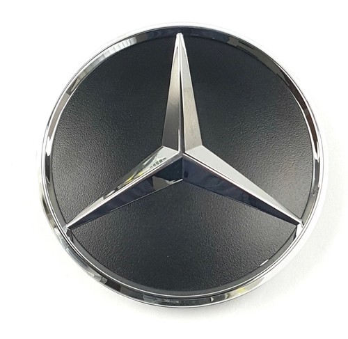 Genuine rear door star badge - rear,