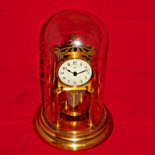 400-Day Anniversary Disc Pendulum Dome Clock, Working And Keeps Very Good Time.
