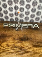 Nissan Primera car badge