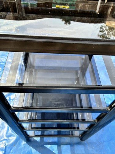 Black glass and metal - and,