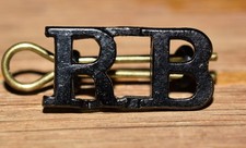 Rifle Brigade shoulder title, blackened metal
