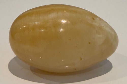 Polished honey calcite crystal - honey,