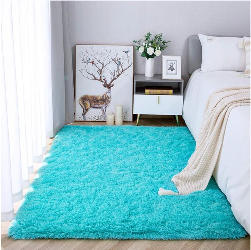 Solid teal shag carpet area - teal,