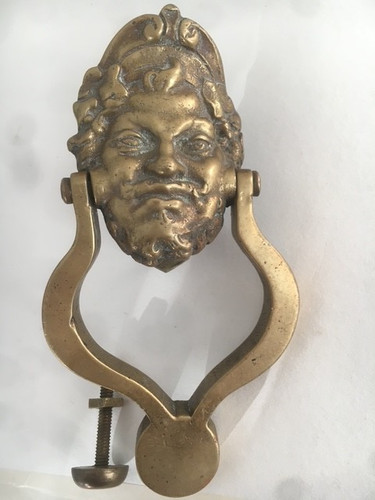 Solid brass head door