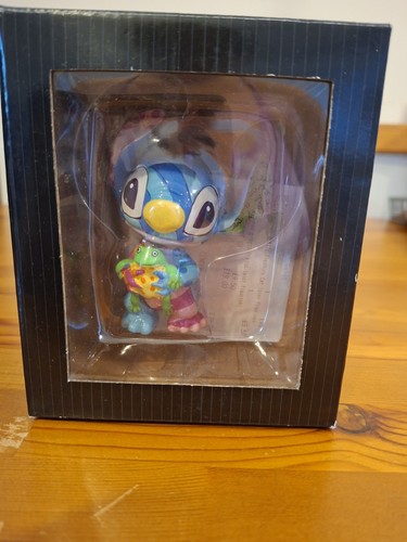 Disney britto stitch holding - britto,