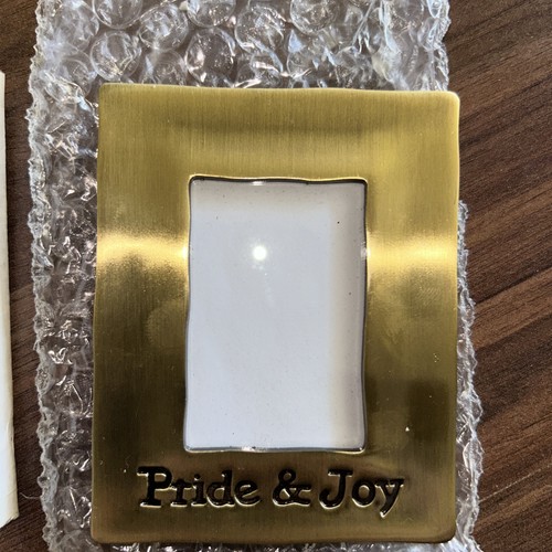 Small brass pride - “pride, joy”