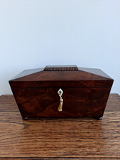 Victorian flame mahogany tea caddy