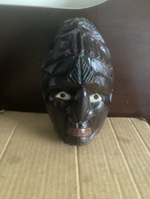 African wooden head carved from a nut,size Shown
